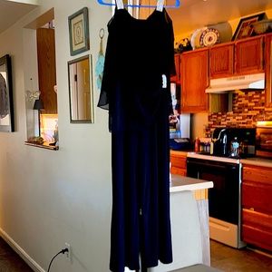 black jumpsuit with bling on the shoulder straps and waist. MP